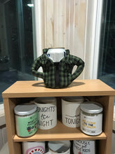 Green and black plaid  jacket koozie for your favorite canned beverage. Fits a 12 ounce can and looks like a jacket.