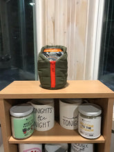Olive and orange puffer vest koozie for your favorite canned beverage. Fits a 12 ounce can and looks like a  puffer vest.